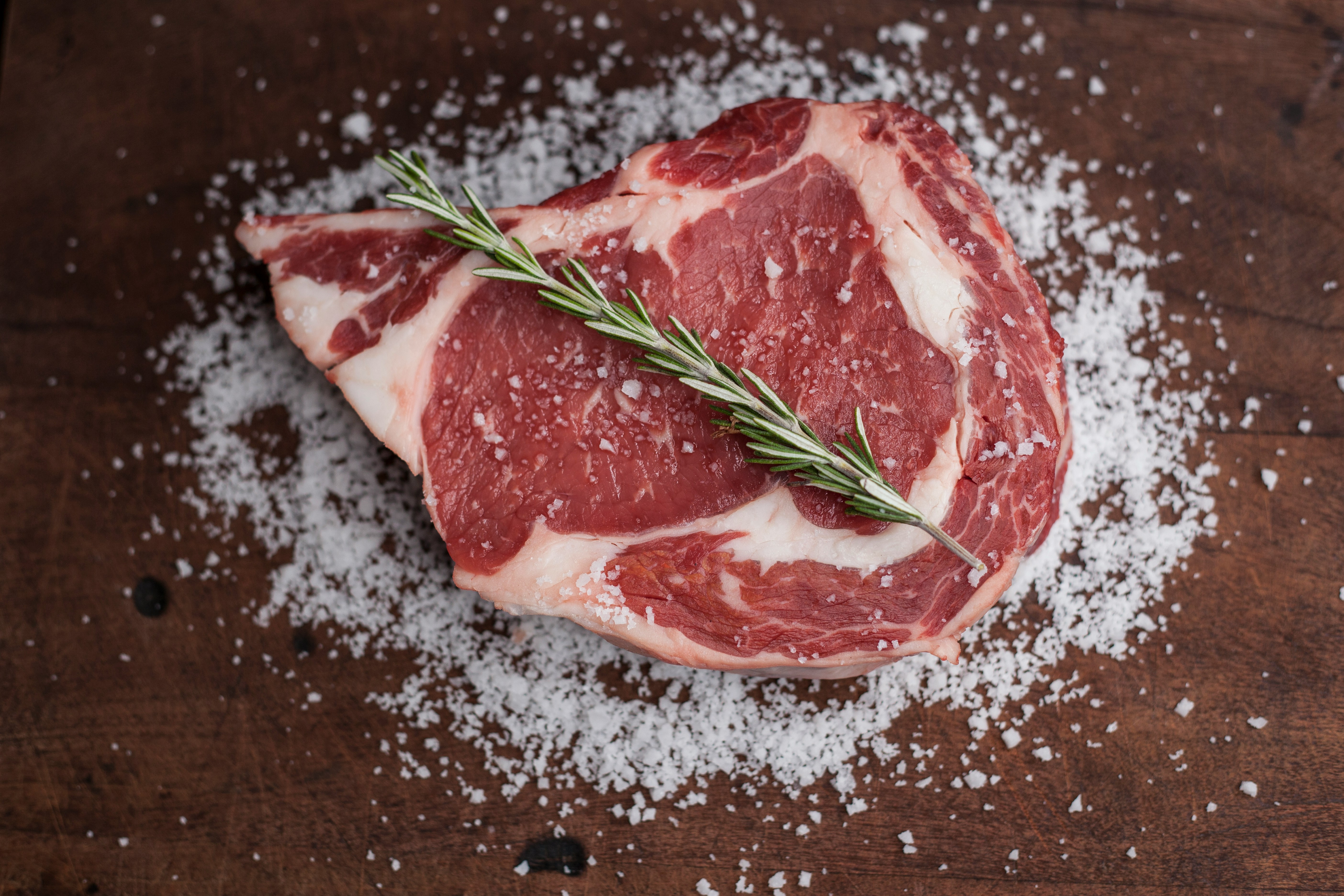Steaks resting on counter